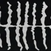 Luxury designer rug featuring abstract wavy white lines on black, ideal for high end handmade wool rugs collections.