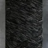 Luxury custom designer rug with intersecting dark diagonal lines on a gray base.