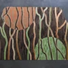 Luxury custom wool rug featuring abstract wavy lines and bold orange and green circles.