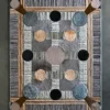 Atlas Hide 30060 is a luxury designer rug featuring geometric patterns in muted tones, ideal for high end interiors.
