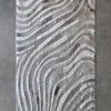 Drift Hide 28893 luxury designer rug features wavy gray and beige lines on a high end handmade hide mosaic.