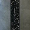 Custom Hide 15172 is a luxury designer rug featuring a constellation on black, resembling high end handmade hide rugs.