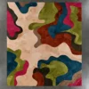 A square designer rug with organic shapes in luxe tones enhances the refined look of this high-end custom hide rug.