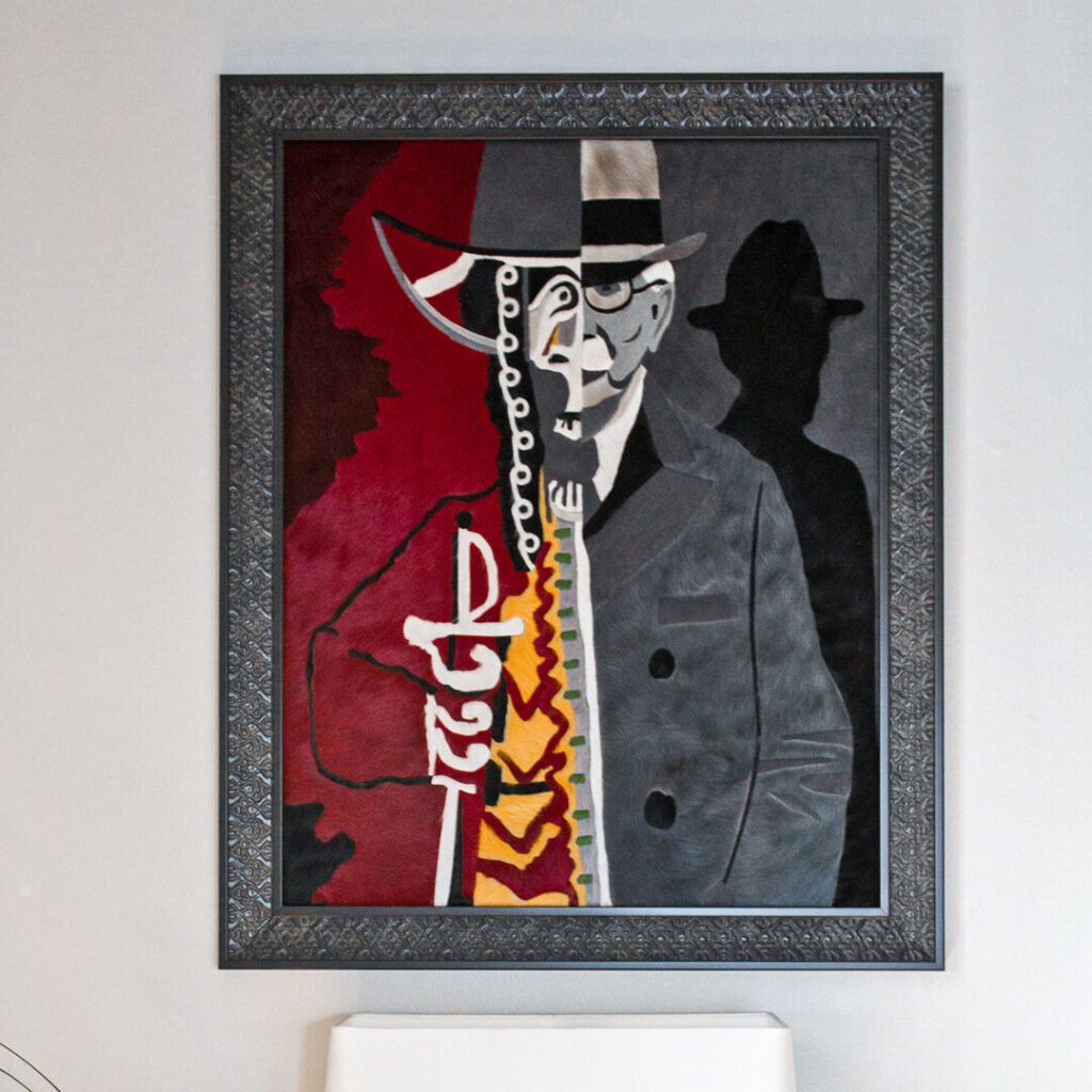 Framed abstract art inspires this luxury designer rug, split red and black, evoking high end handmade wool rug style.