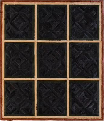 A grid of nine black textured squares on brown showcases a luxury designer hide rug.