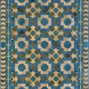 Luxury designer rug with geometric squares and octagons in blue, beige, green, and decorative borders.