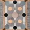 Geometric abstract designer rug in gray, beige, brown—luxury custom handmade wool and hide design.