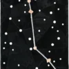 Black luxury custom rug featuring the Sagittarius constellation in white, ideal for high end designer interiors.