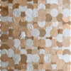 Luxury designer rug with overlapping beige, tan, and white textured circles in a high end geometric pattern.